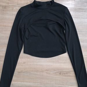 Shein brand. Black long sleeve, slight open chest, crop top. Size L. Like new.
